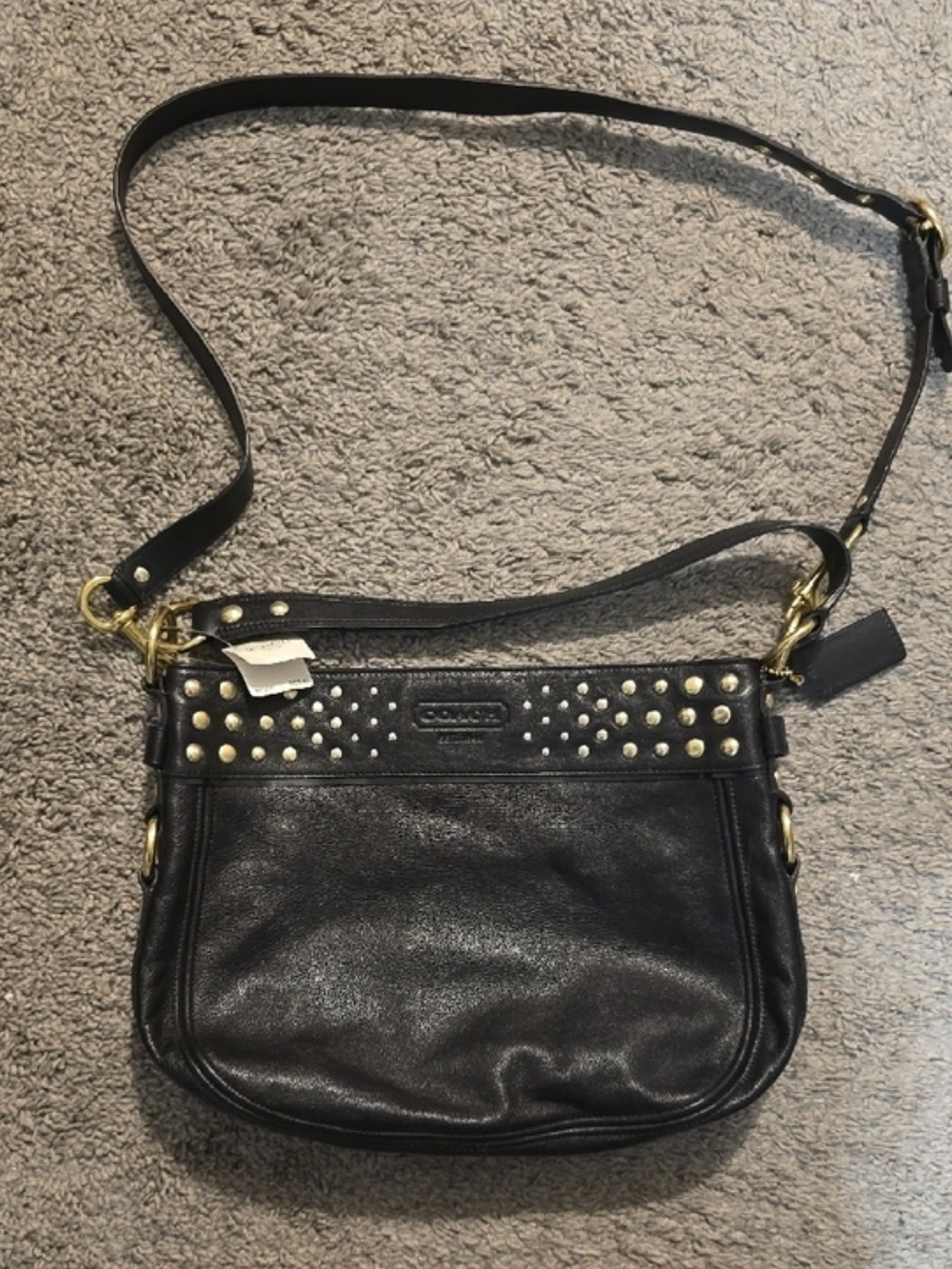 Coach F15237 "Zoe" studded hobo shoulder bag.